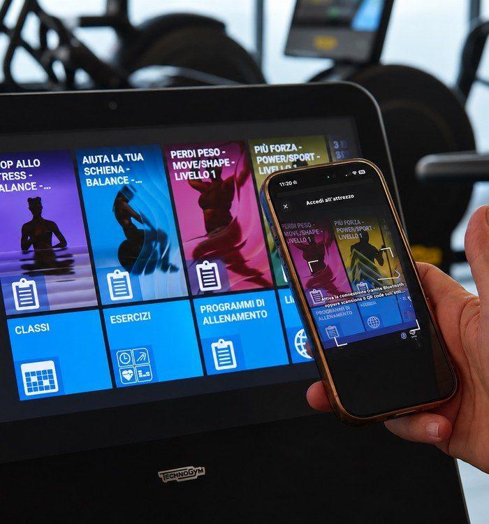 Tablet e smartphone con l'app Technogym My Wellness Cloud